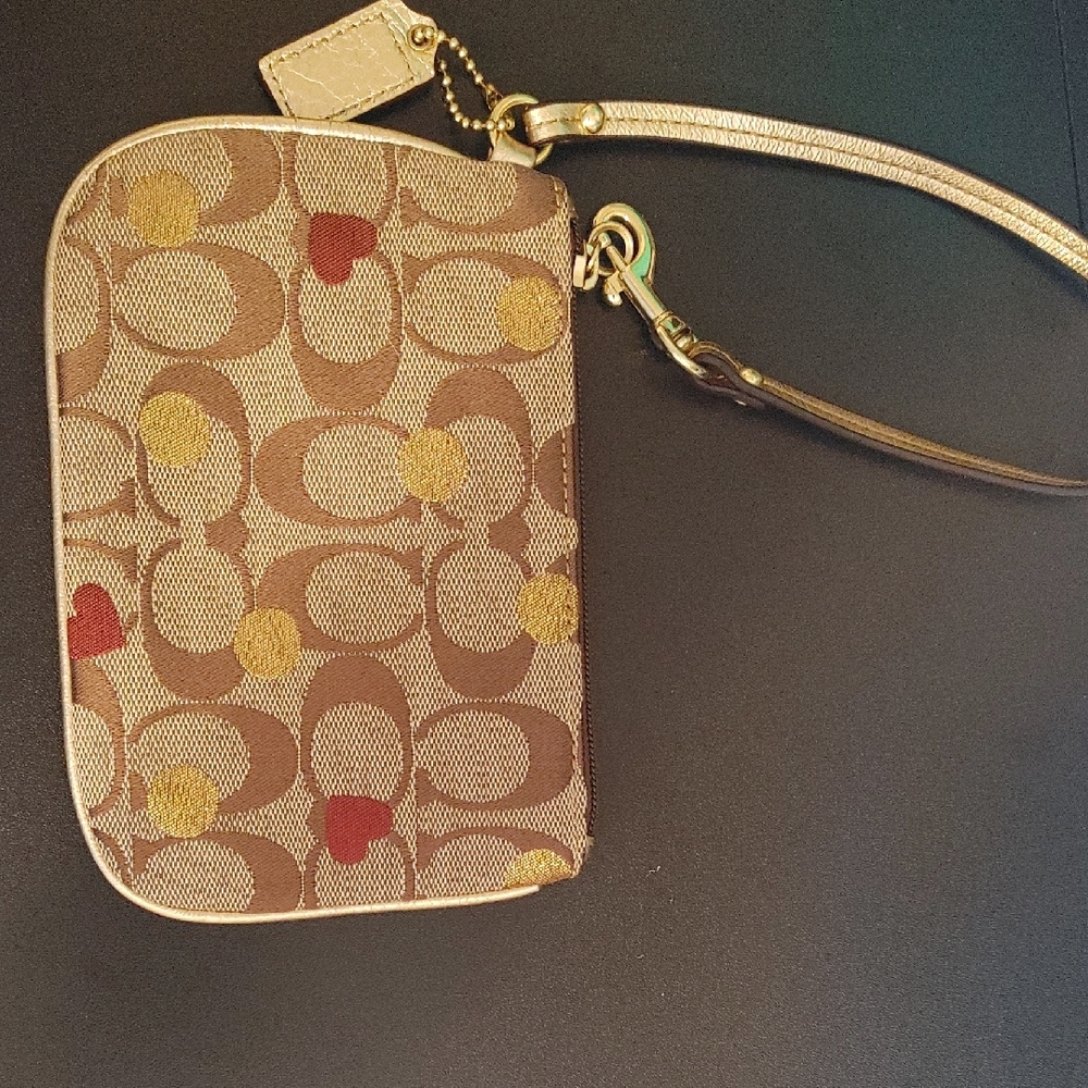 Coach Signature Wristlet in Gold and Red Accents